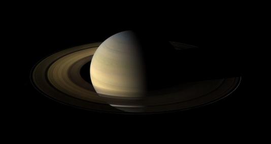 Saturn,_its_rings,_and_a_few_of_its_moons